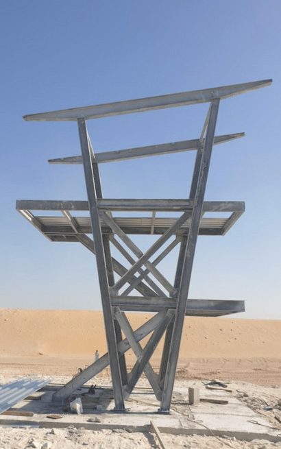 Steel tower with cross-bracing and platforms